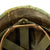 Original U.S. WWII Vietnam Reissue M1 McCord Front Seam Swivel Bale Helmet with USMC Camouflage Cover Original Items