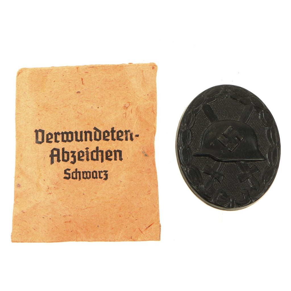 Original German WWII Unissued Hollow Back Black Wound Badge in Packet by Carl Wild of Hamburg Original Items