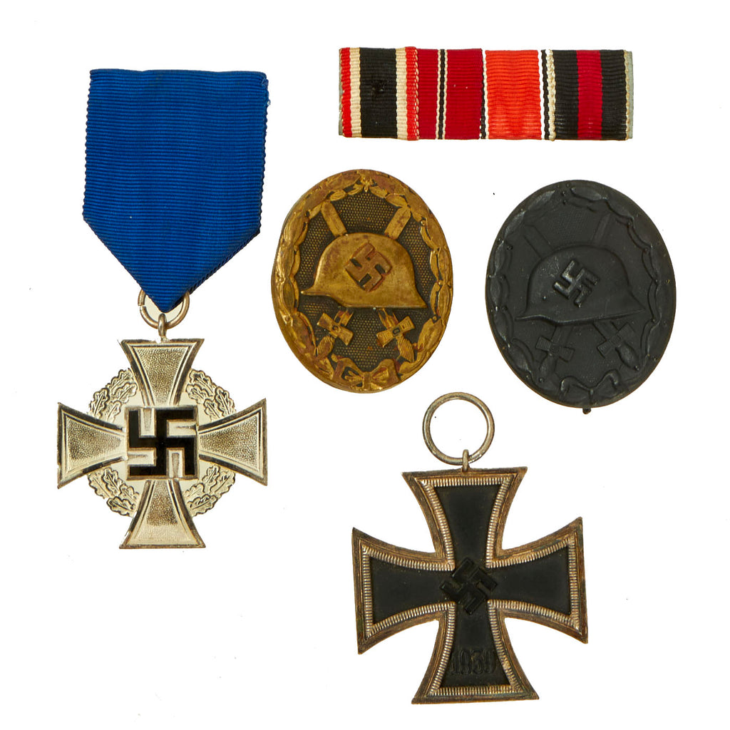 Original German WWII Medal and Insignia Lot Featuring 2nd Class Iron Cross - 5 Items Original Items